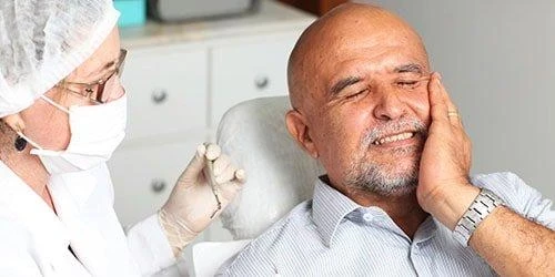 Шатается зуб во сне к чему